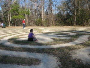 Nancy sitting on a labyrinth